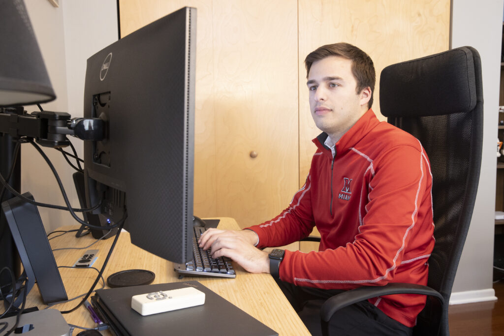 Miami University alumnus, Michael Gallo, at work as part of the check fraud team at JPMorganChase in Columbus, Ohio.
