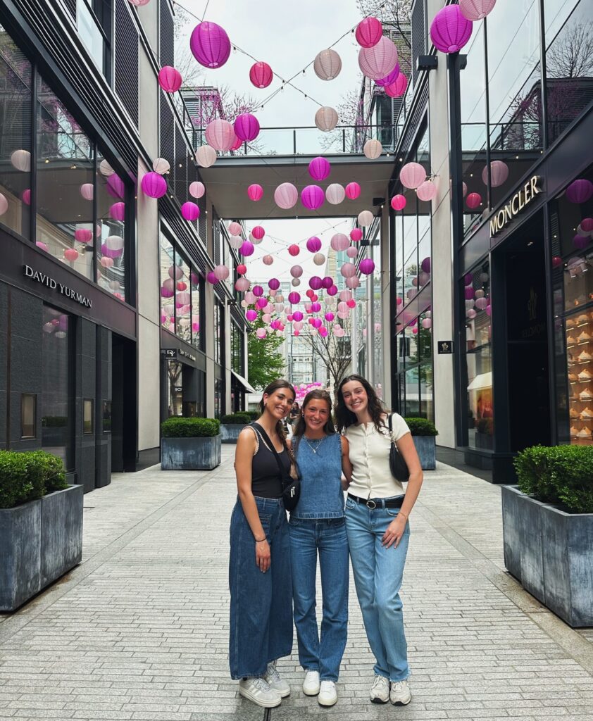 Natalie and 2 students exploring Washington D.C.