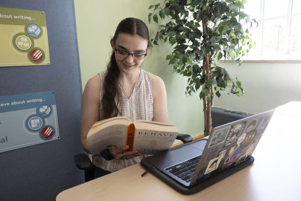 Miami University transfer student Em McGowan working on her coursework.