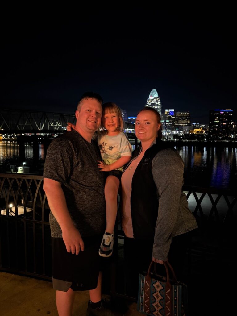 Kurtis with his wife and daughter in Cincinnati.
