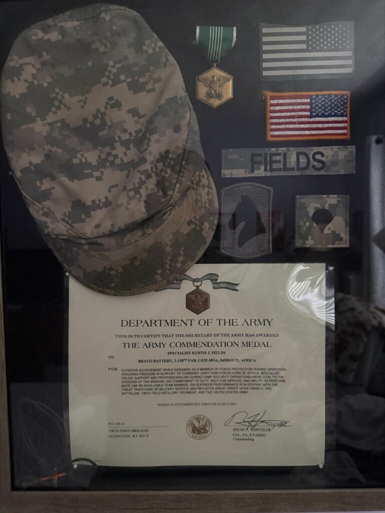 Shadow box for Miami Student Kurtis Fields commemorating his time in the Army