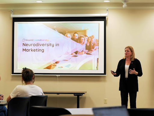 Samantha Kelly presenting Spectrum of Sweets to the capstone class