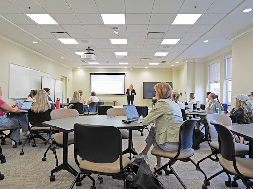 Samantha Kelly presenting to the capstone to introduce their project