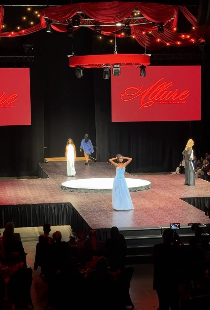 Miami University senior Terren  Lewis takes the runway during the Miami University Fashion and Design Allure fashion show. 