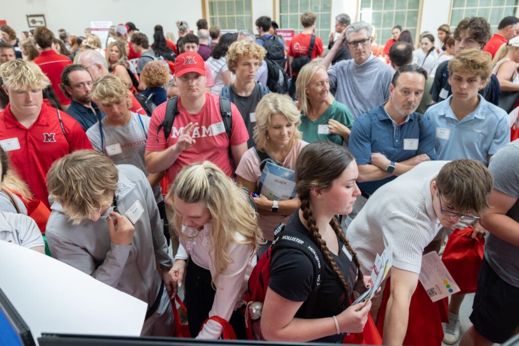 Students and families at the resource fair at orientation