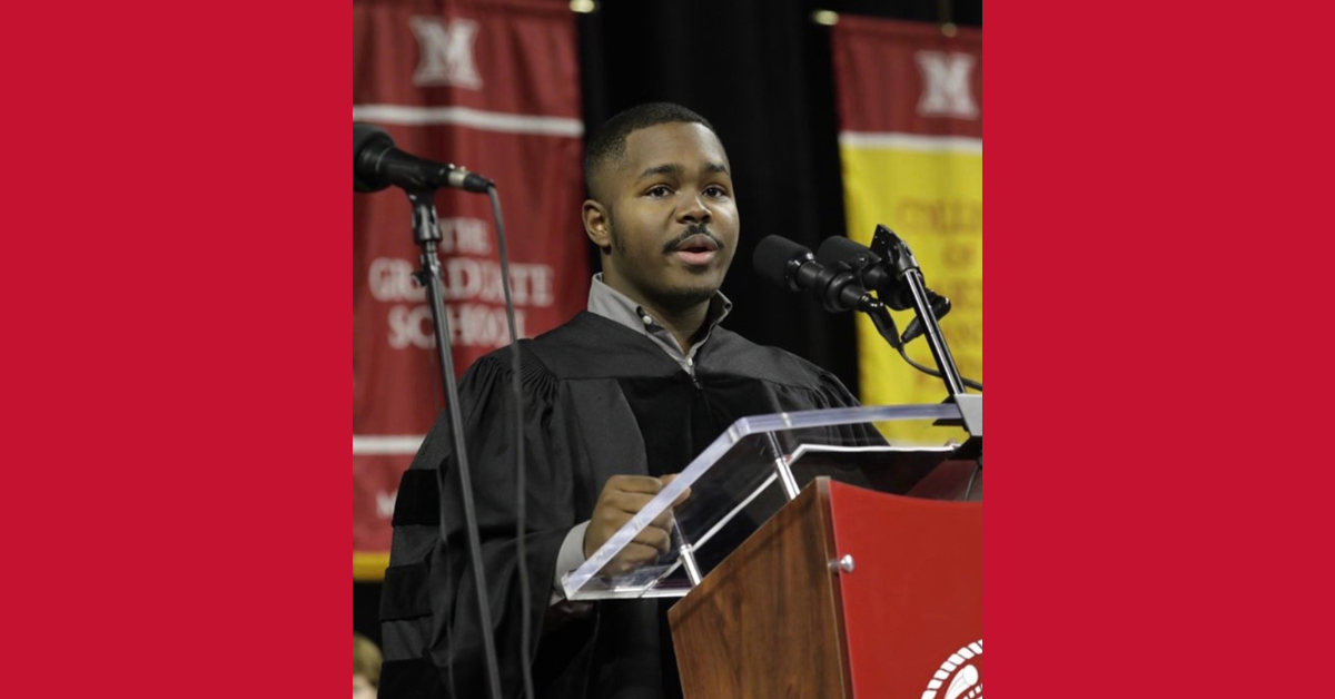 Jaylen Perkins '20 leading the winter 2019 graduating class in the Code of Love and Honor at commencement