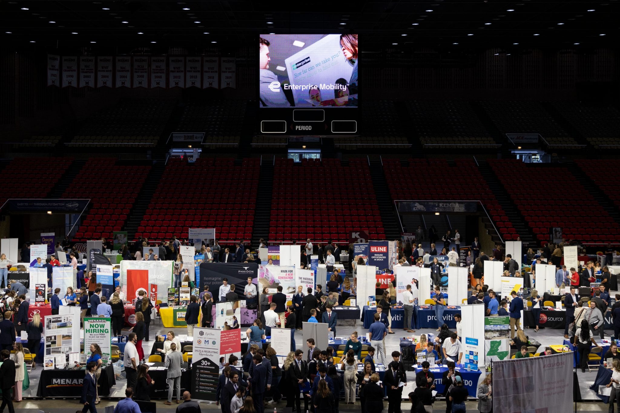 Students speaking with several companies at the Miami University Fall Career and Internship Fair